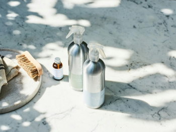 a group of bottles and a rope on a snowy ground